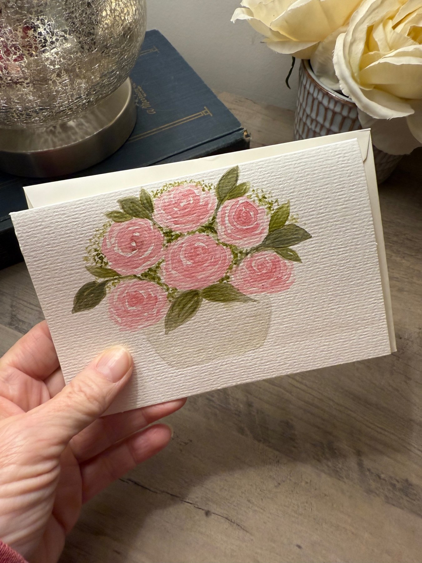 Pink rose bouquet painted on a small watercolor card