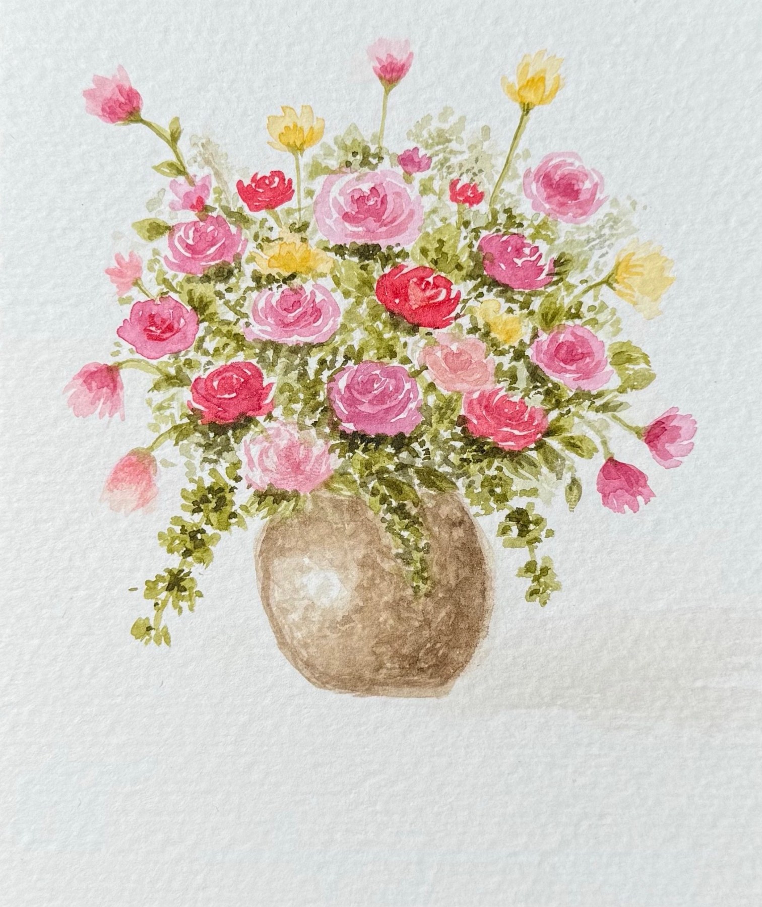 Pink and yellow watercolor flowers in a rounded vase